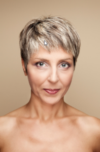 A woman with a pixie cut hairstyle